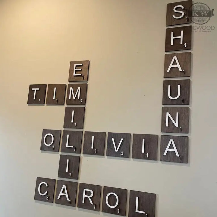Wall-mounted scrabble tile wall art displaying personalized 3D laser cut scrabble tiles