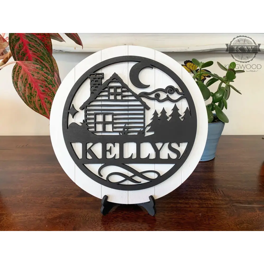 Personalize round shiplap sign with cabin and mountain scene on shiplap background