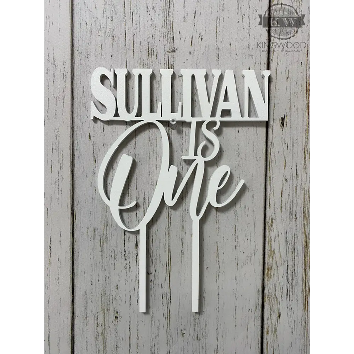 White custom cake topper with personalized laser cut design for special occasions