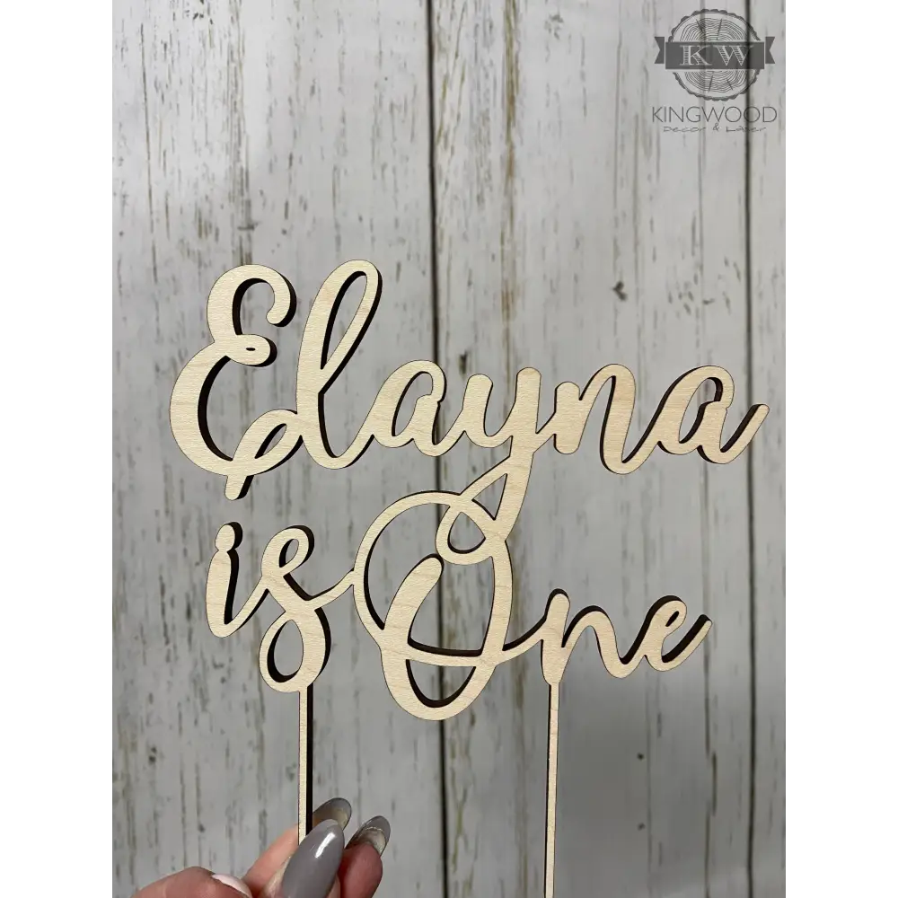 Wooden custom cake topper with personalized laser cut design for special occasions