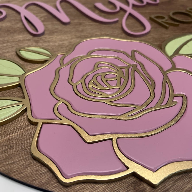 Nursery round name signs with rose