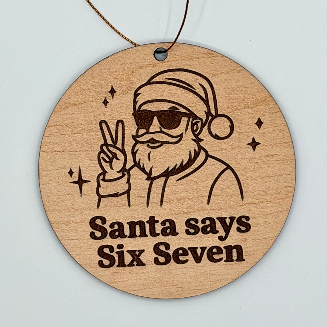 Santa Says 67 — Laser Engraved Christmas Ornament