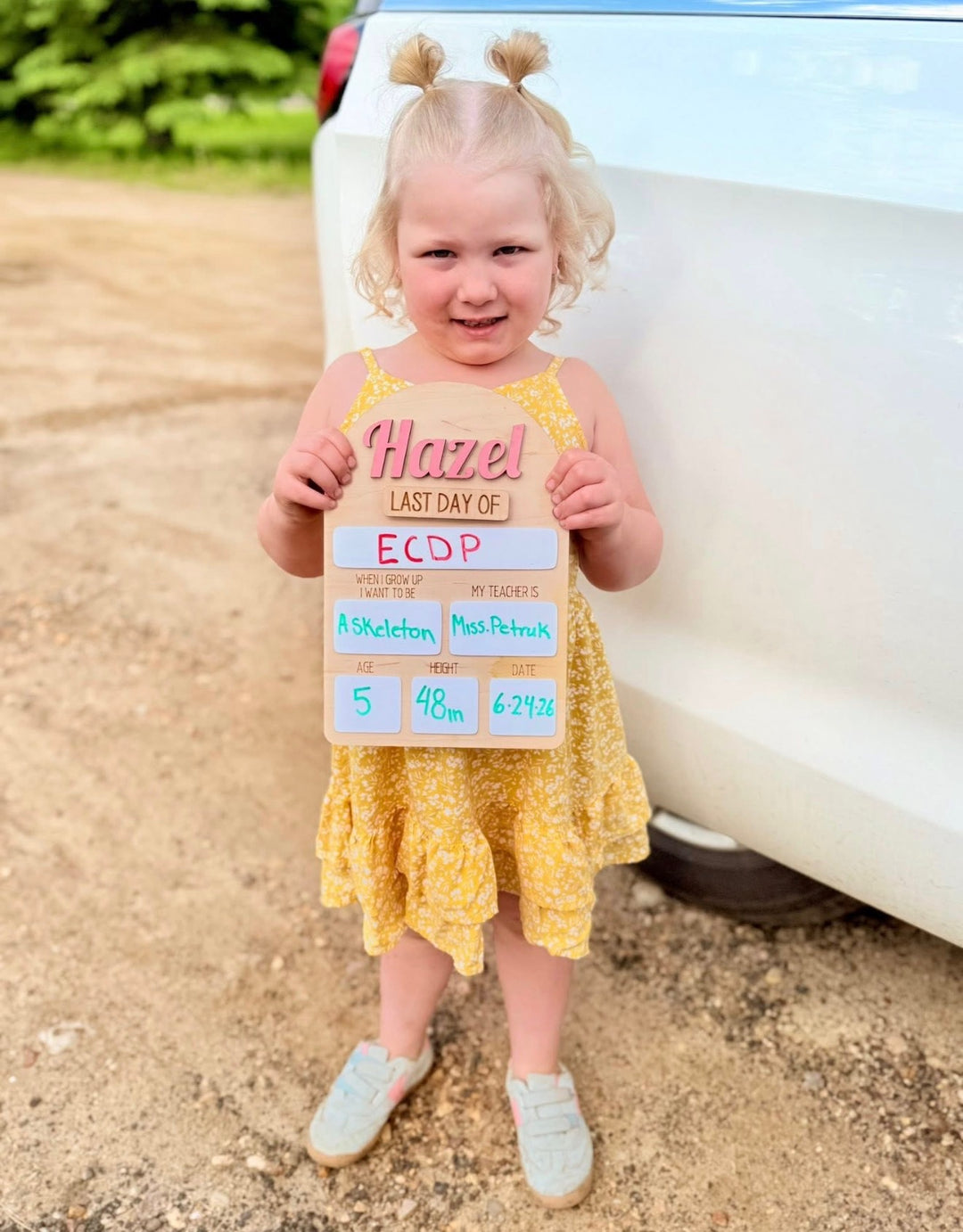 Reusable school milestone board with personalized name