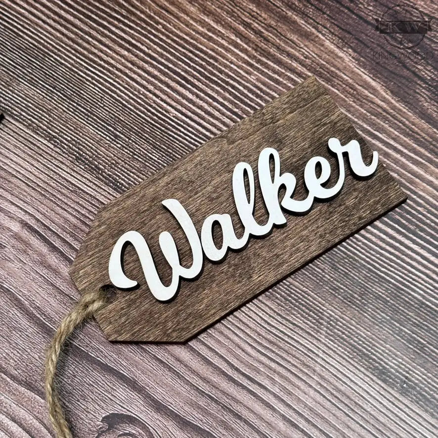 Laser cut wooden Christmas stocking name tag with white lettering for custom wooden Christmas decor
