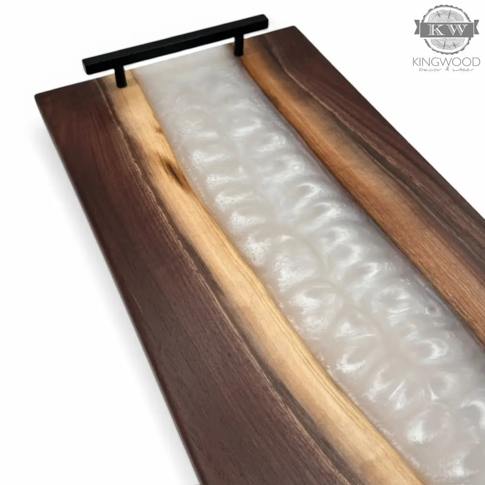 Epoxy charcuterie board with black metal handles in walnut