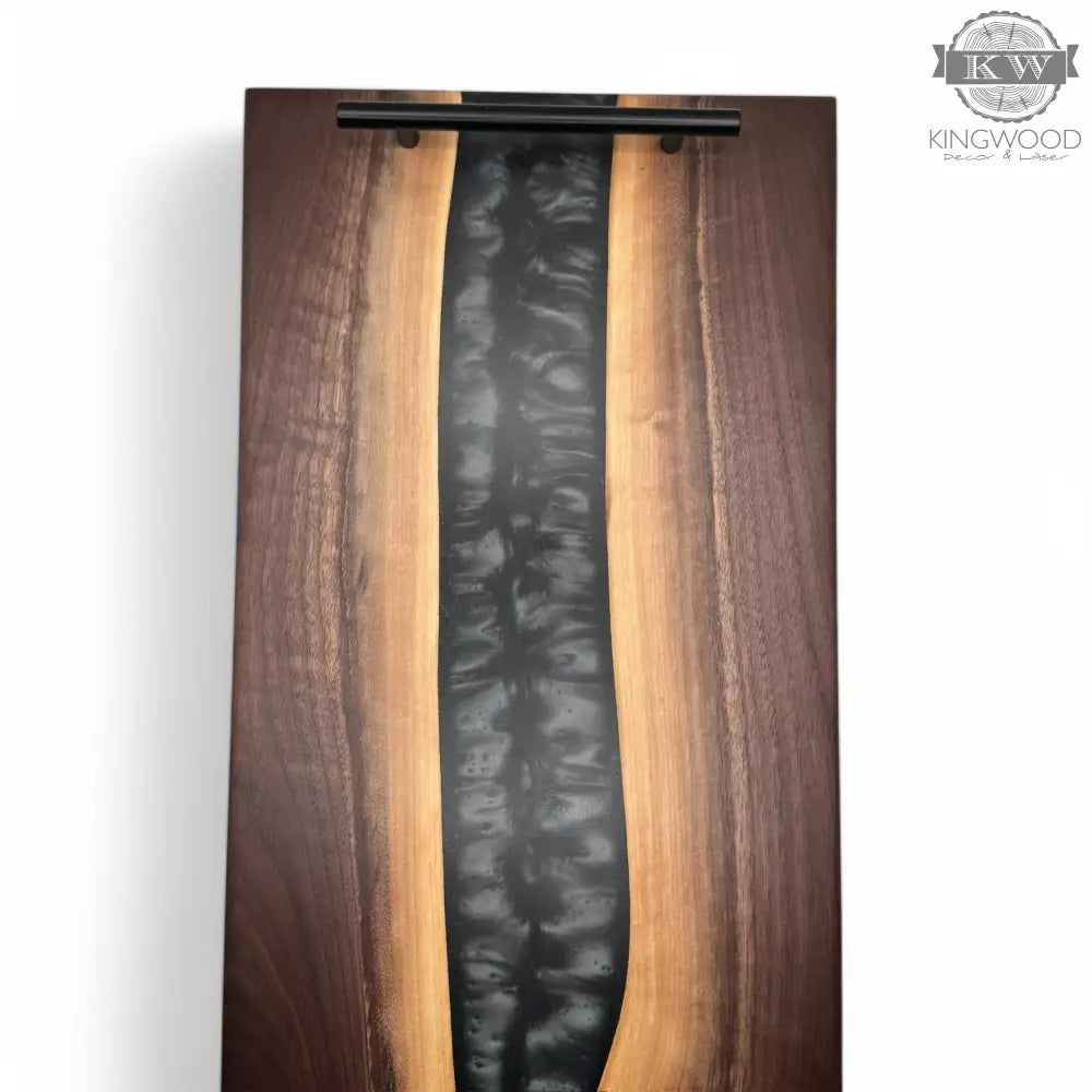 Epoxy charcuterie board with black metal handles in walnut