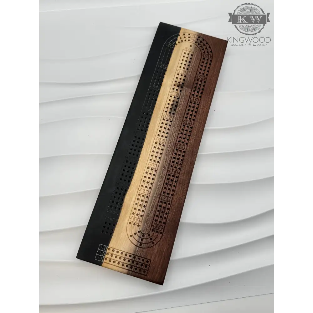 Handcrafted live edge walnut cribbage board with epoxy