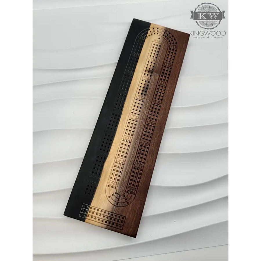 Handcrafted live edge walnut cribbage board with epoxy