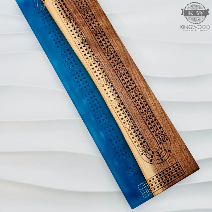 Handcrafted live edge walnut cribbage board with epoxy