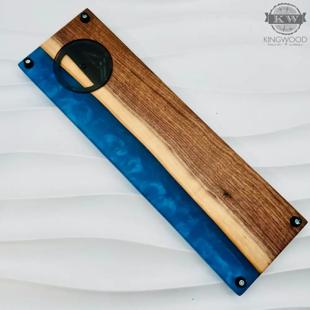 Handcrafted live edge walnut cribbage board with epoxy