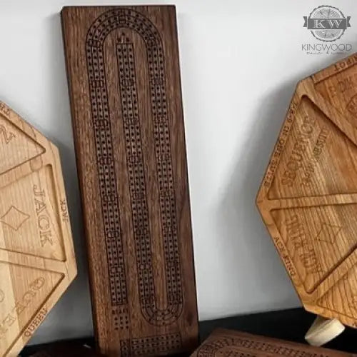 Handcrafted walnut cribbage board with metal pegs