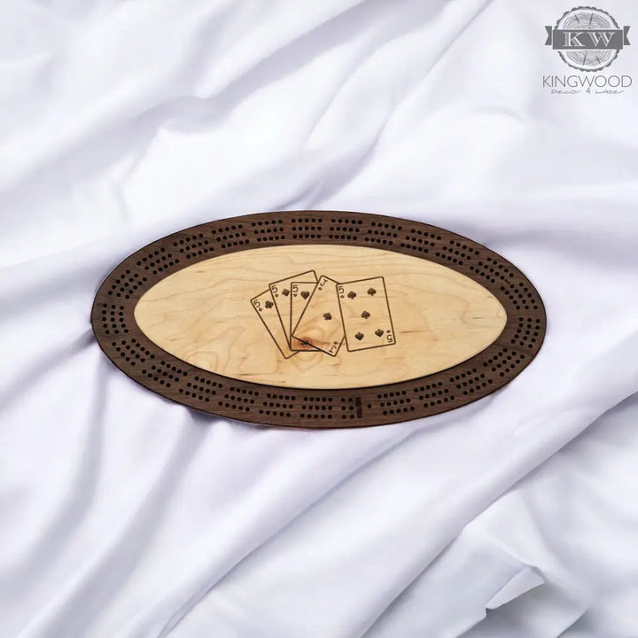 Handcrafted walnut cribbage board with metal pegs