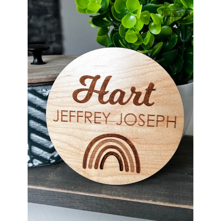 Engraved wooden name plaque on natural birchwood with unique grain, ideal for cutting boards