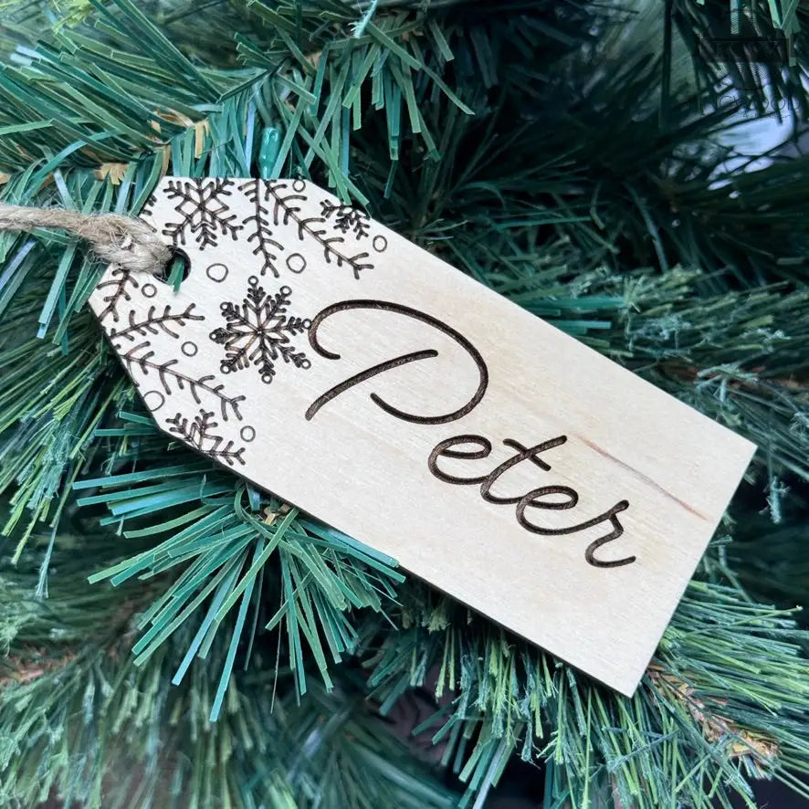 Wooden gift tag with snowflake design from personalized engraved stocking tags collection