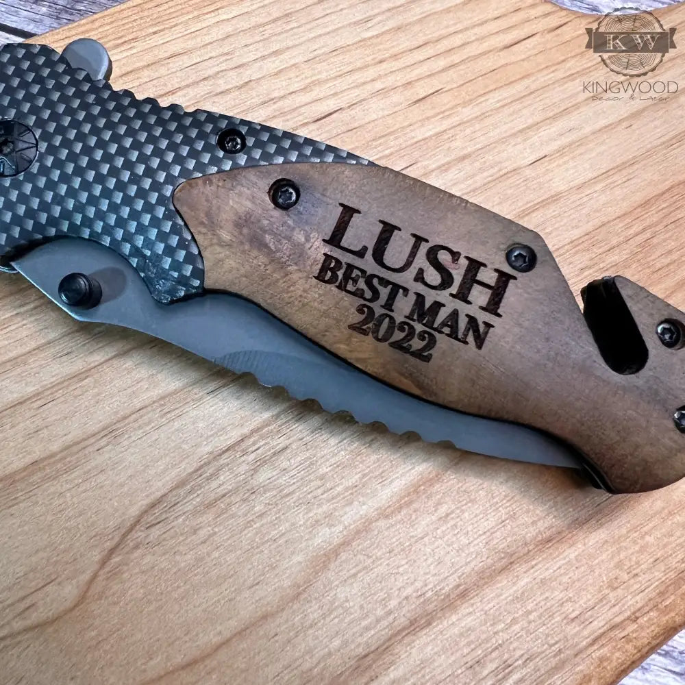 Engraved folding pocket tool with wooden handle and stainless steel blade