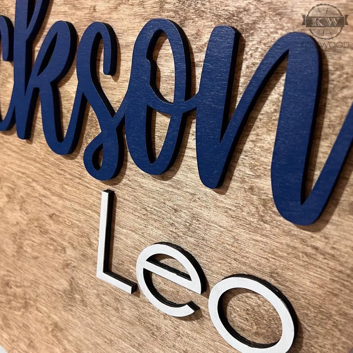 Rustic baby nursery round wooden name sign for personalized decor in a rustic baby nursery