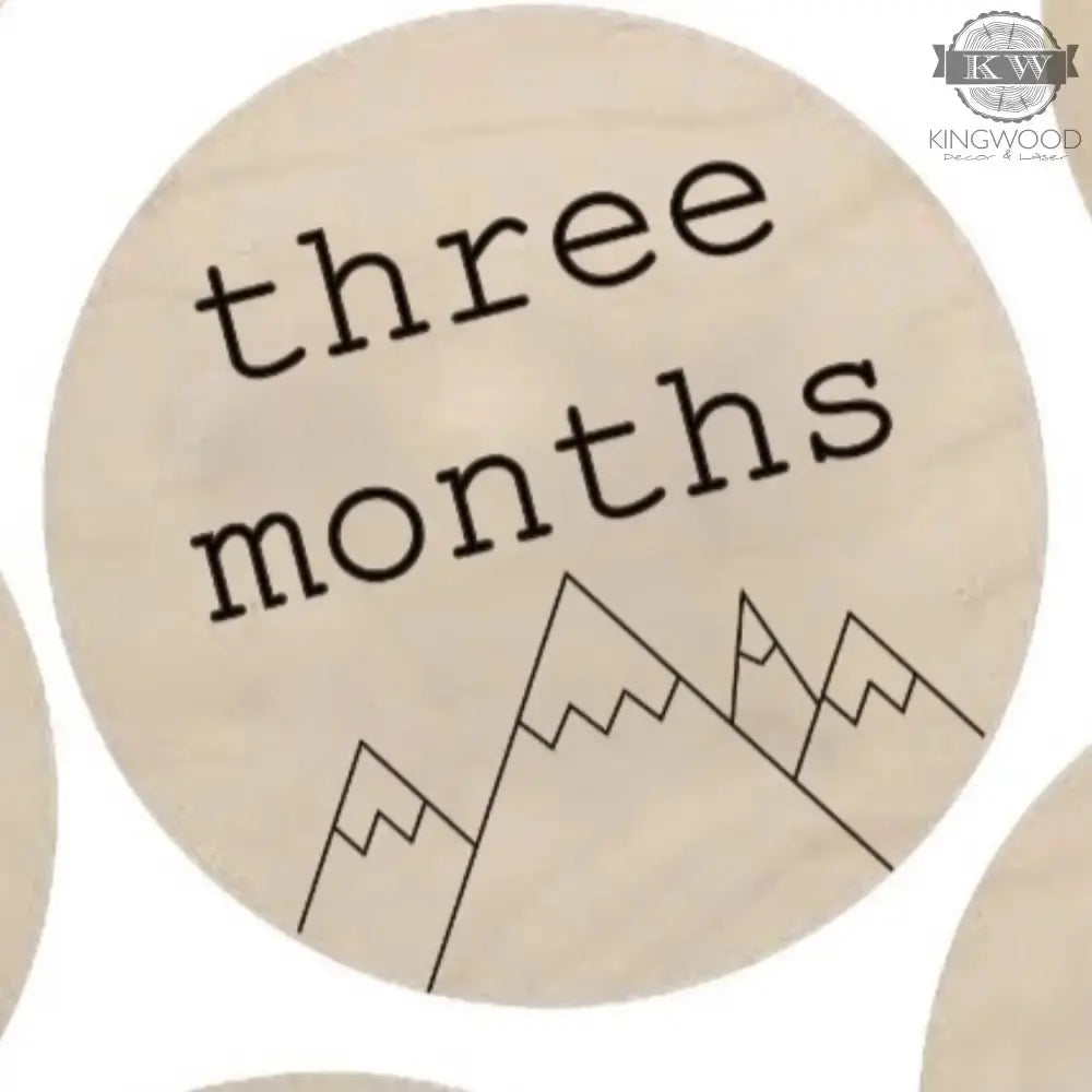 Wooden milestone disc from baby’s monthly milestones set with mountain design