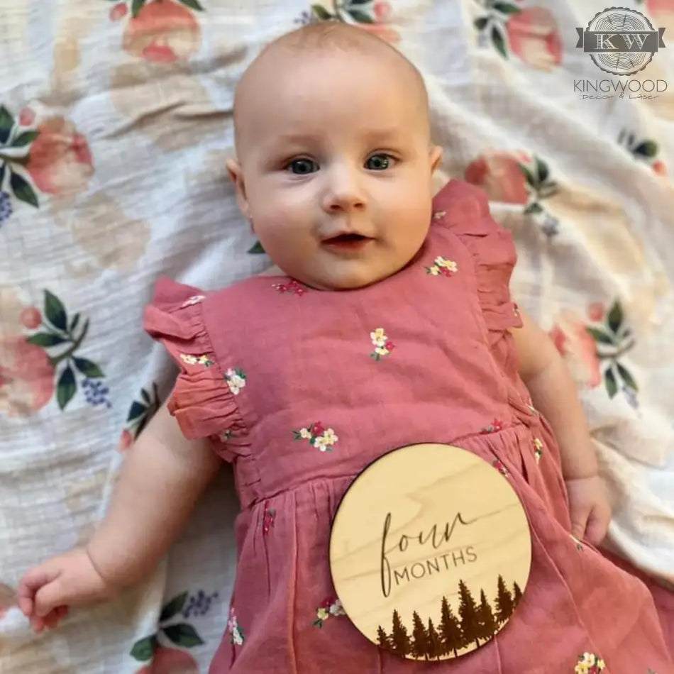 Baby’s four months milestone marker from Baby Monthly Milestones Set for photography and gifts