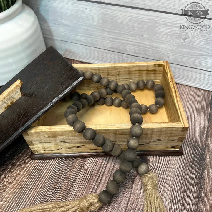 Beautifully handcrafted wooden bead garland with tassels for wooden keepsake box decor