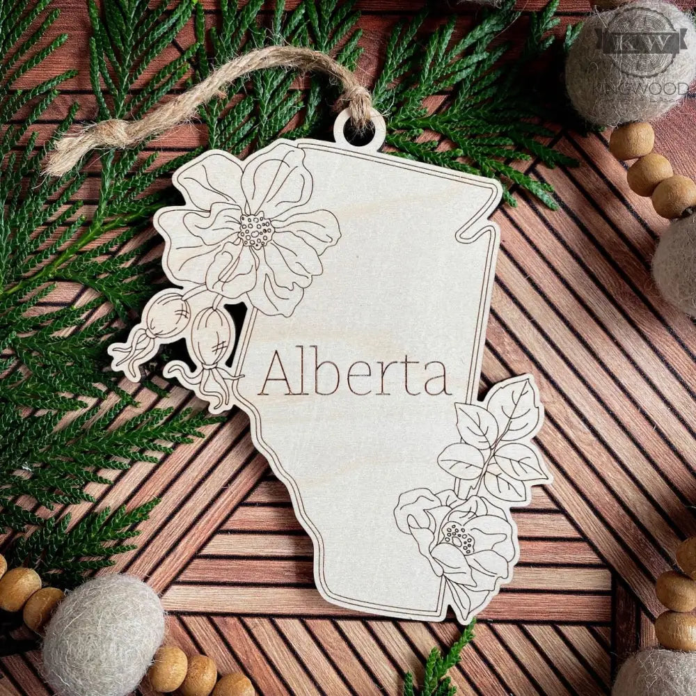 Alberta-shaped wooden ornament, a Canadian provincial Christmas decoration for festive displays