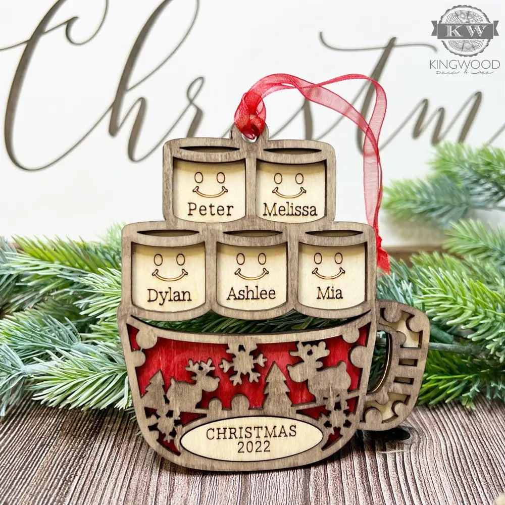 Personalized family names ornament featuring hot cocoa design for holiday home decor or gift