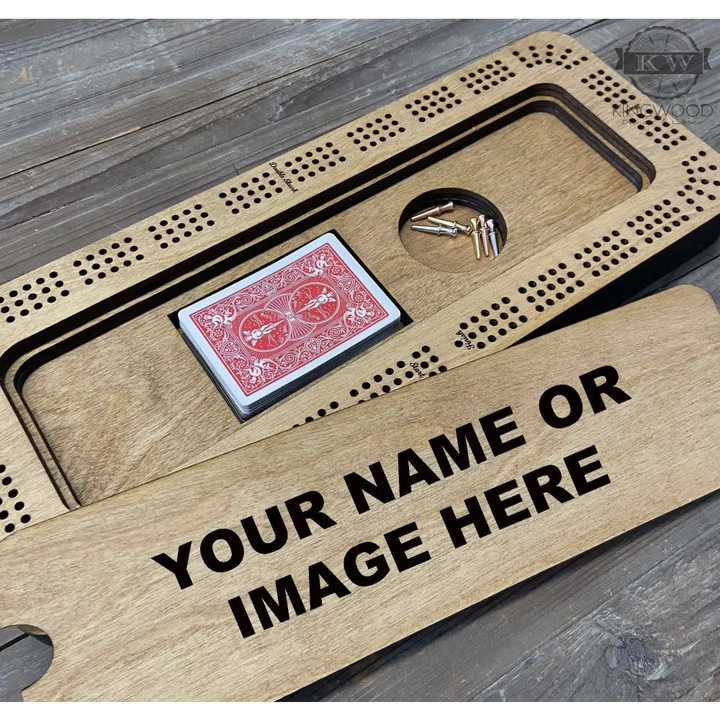 Personalized Baltic Birch cribbage board with storage compartment and metal pegs for gaming