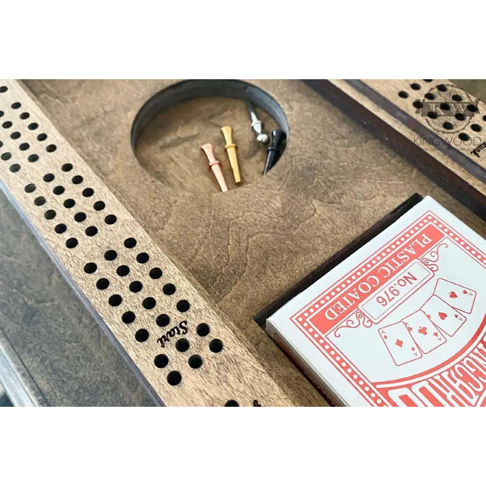 Personalized Baltic Birch cribbage board with storage compartment and metal pegs for gaming