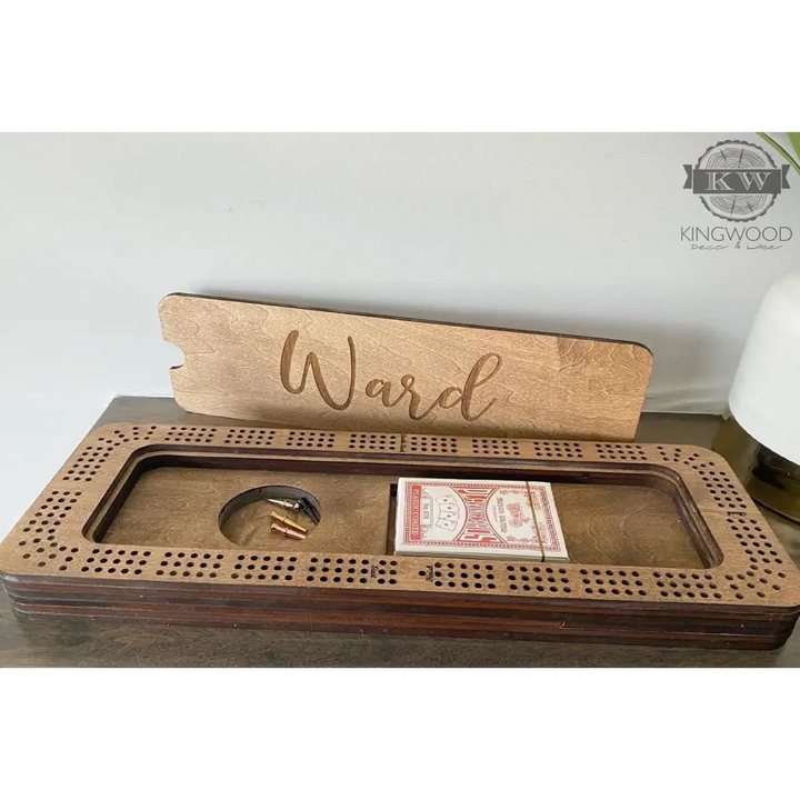 Personalized Baltic Birch cribbage board with storage compartment and metal pegs for gameplay