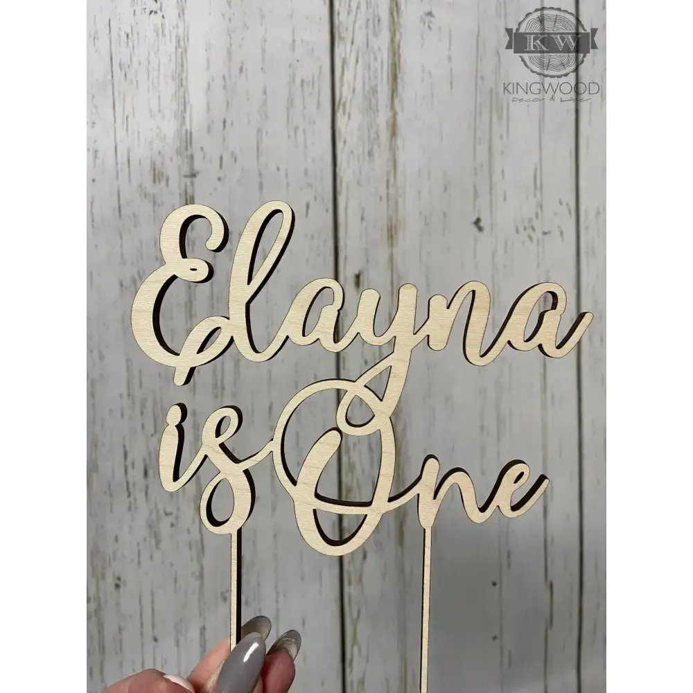 Wooden custom cake topper with personalized laser cut design for special occasions