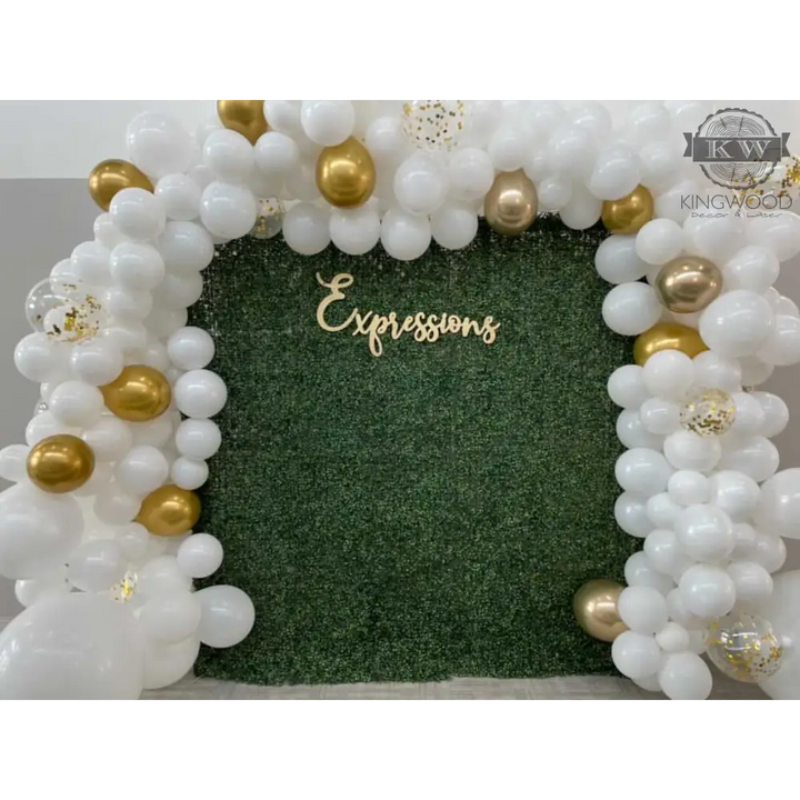 Laser cut balloon arch with green backdrop for home decor and custom name signs