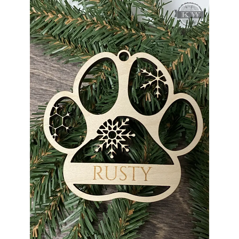 Wooden dog paw custom ornament personalized with your pup’s pawprints