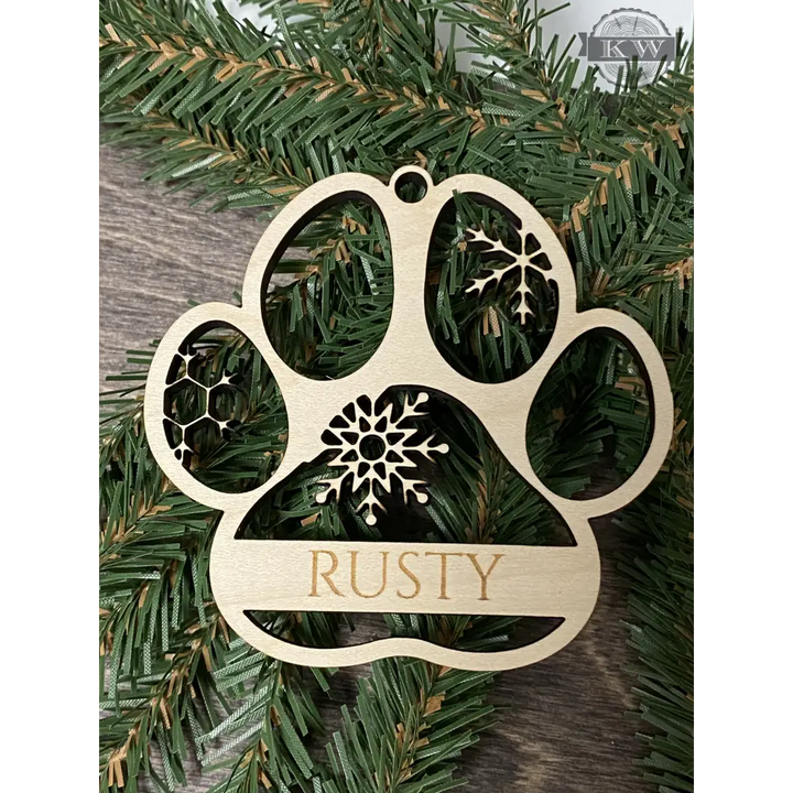 Wooden dog paw custom ornament personalized with your pup’s pawprints