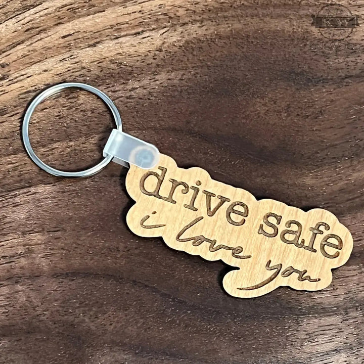 Wooden keychain with engraved text for drive safe or decor gifts, perfect for loved ones