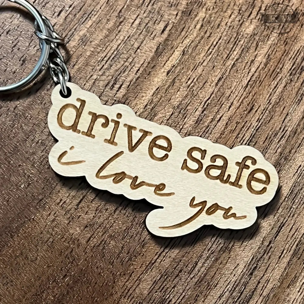 Wooden keychain engraved with drive safe I love you inscription, ideal as decor gift