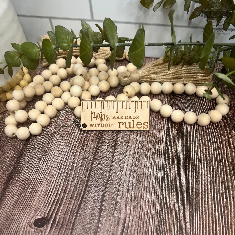 Wooden ruler-shaped keychain from Father’s Day wooden keychains collection showcasing premium laser engraving