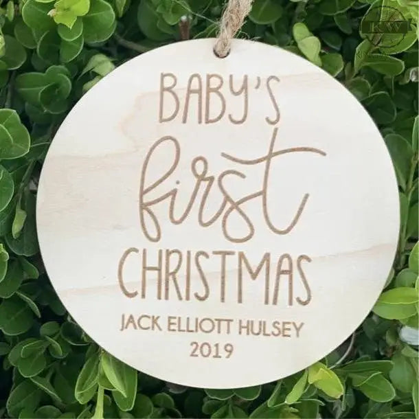 Wooden baby’s first Christmas ornament for tree decor, personalized with baby name