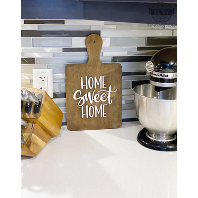 Home sweet home sign in a breadboard shape (decor) cutout,