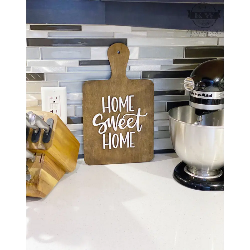 Home sweet home sign in a breadboard shape (decor) cutout,