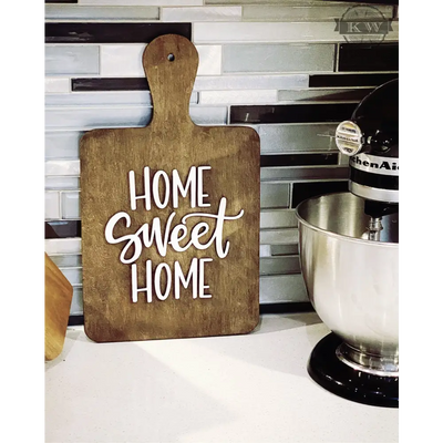 Home sweet home sign in a breadboard shape (decor) cutout,