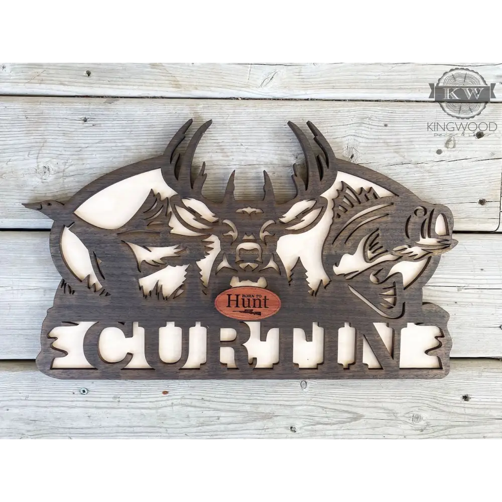 Wooden sign with deer, fish, and name showcasing custom fishing monogram decor