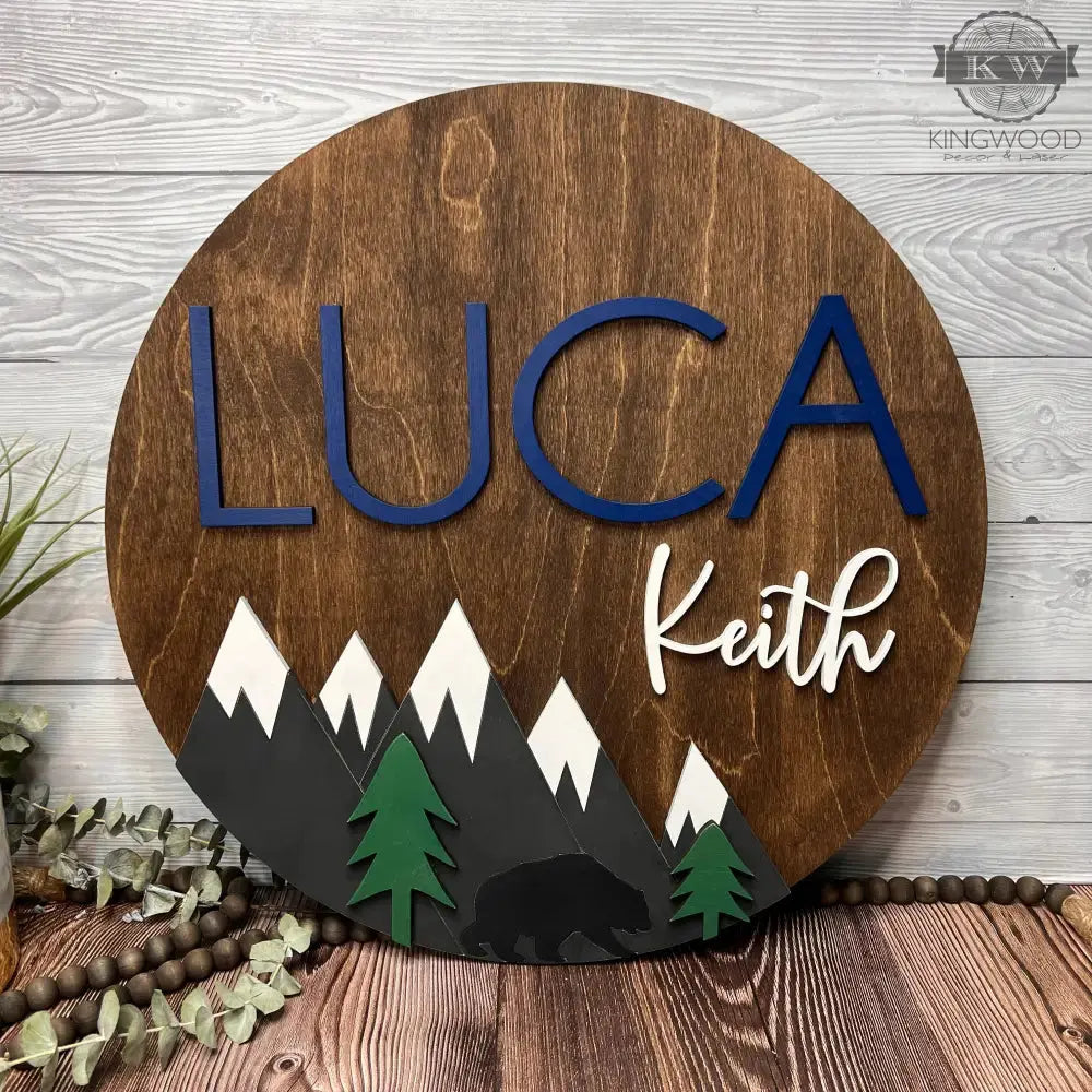 Wooden name sign with mountain and bear design for nursery decor in Fort McMurray