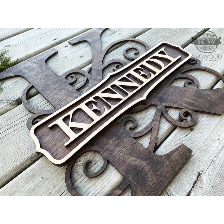 Large 3D multi-layer wooden monogram sign for family heritage display