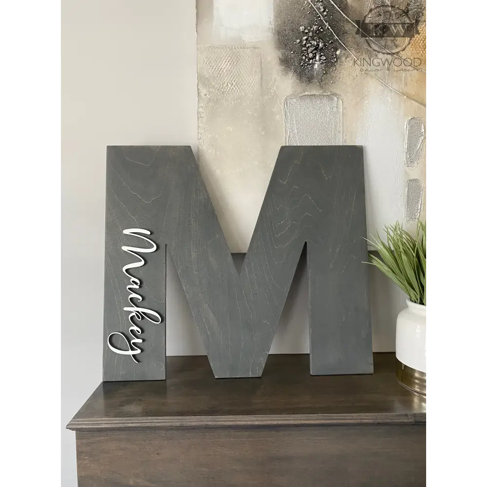 Gray wooden letter M shaped signature sign for wedding guestbook alternative