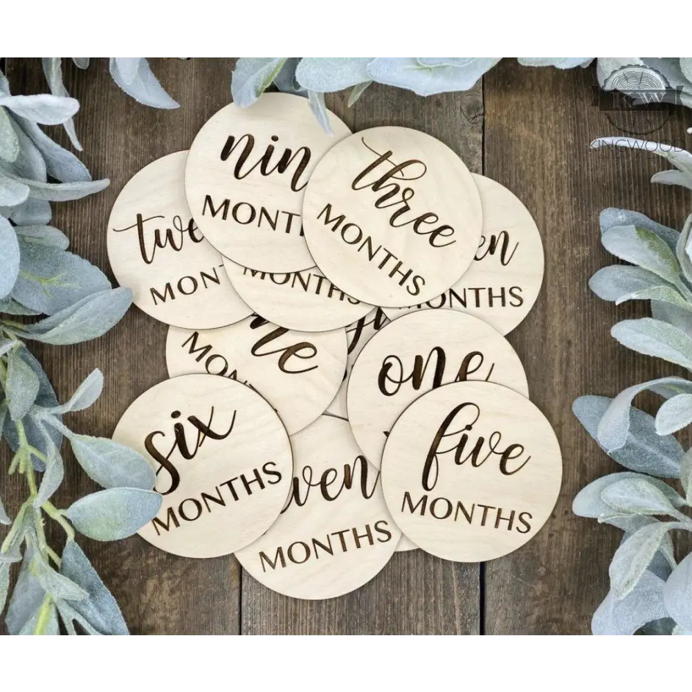 Wooden baby milestone discs for monthly milestones set to celebrate baby’s growth