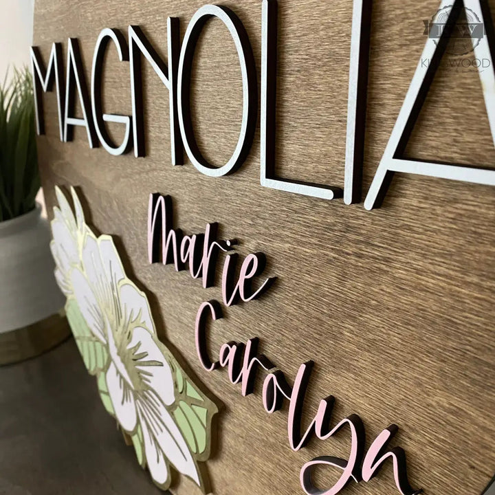 Personalized nursery round sign with magnolia flower design for bedroom decor