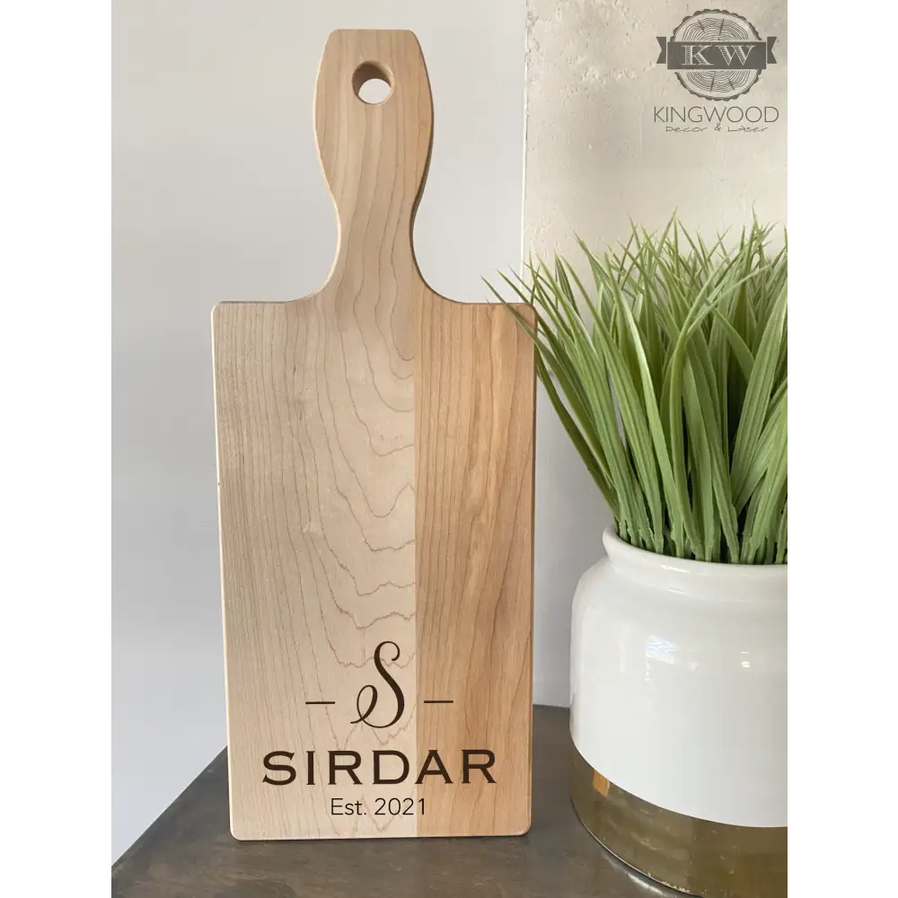 Personalized family name wooden cutting board with handle for kitchen decor
