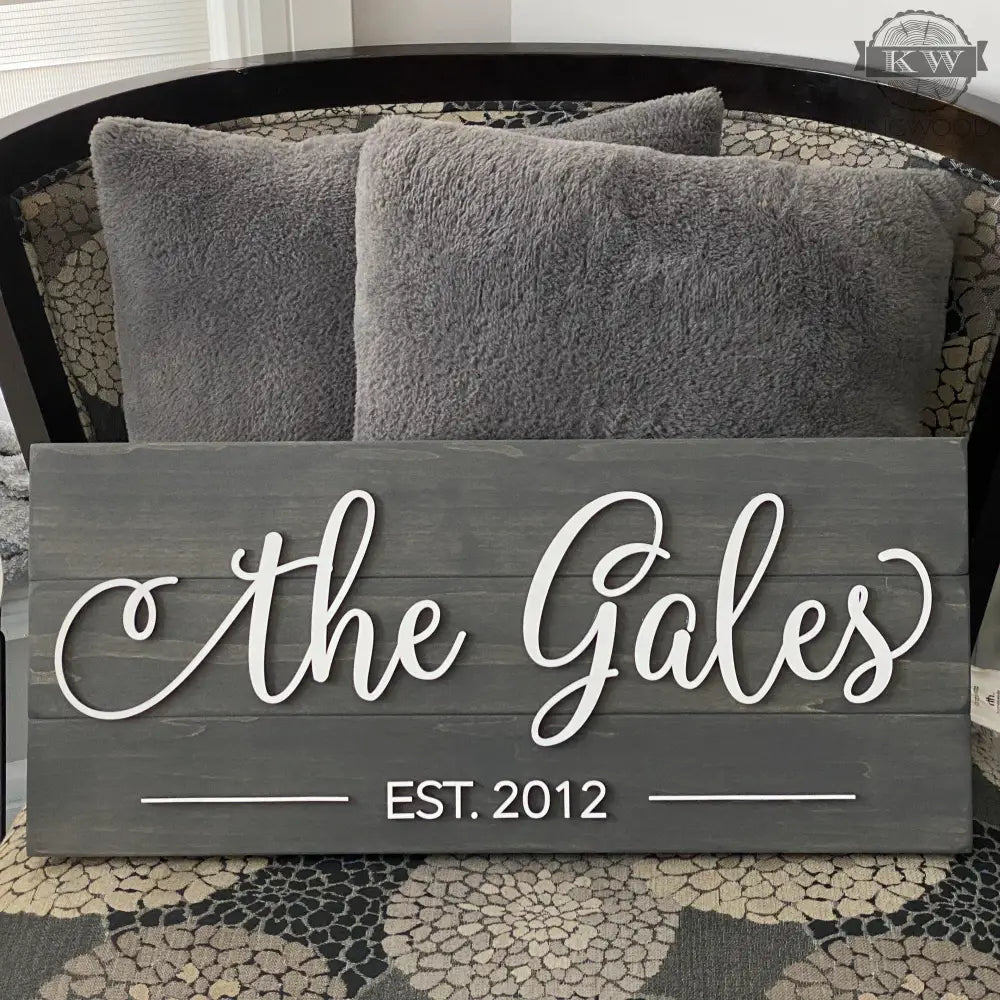 Gray wooden personalized family name decor with etched EST date and laser cut maple letters