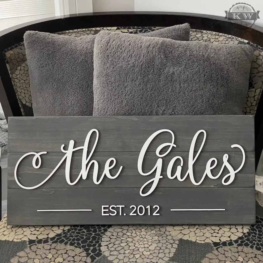 Gray wooden personalized family name decor with etched EST date and laser cut maple letters