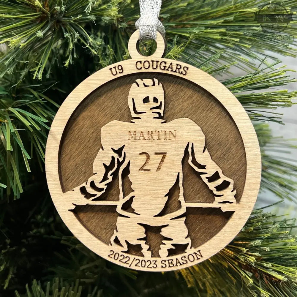 Personalized hockey ornament engraved wooden Christmas tree decoration featuring a wooden hockey player ornament
