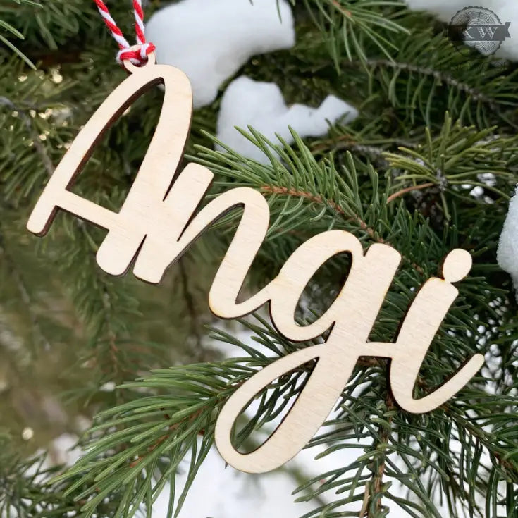 Wooden name ornament featured in personalized Christmas decor in Fort McMurray
